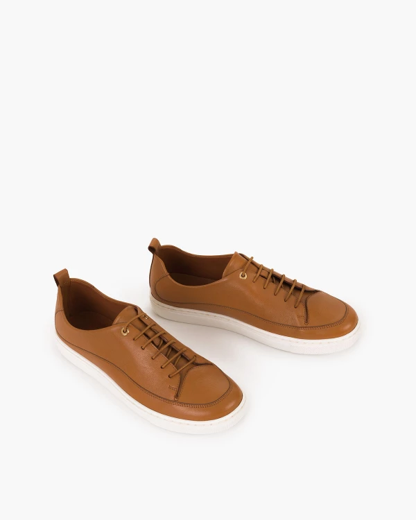 Brązowe trampki damskie ze skóry licowej na płaskim obcasie