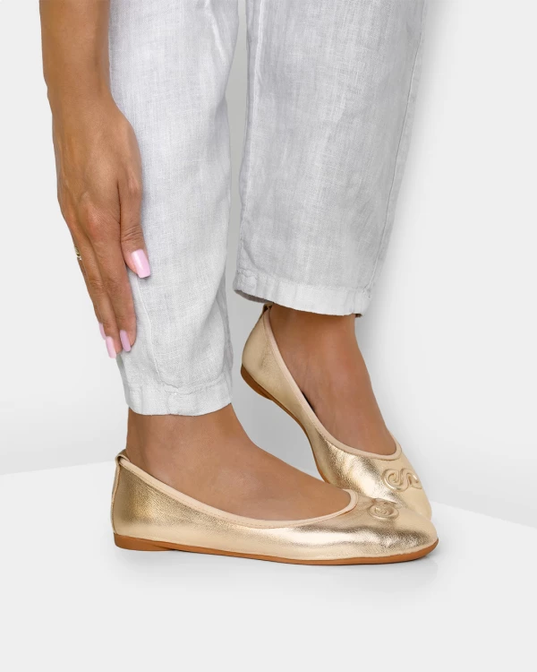 Złote baleriny damskie skórzane